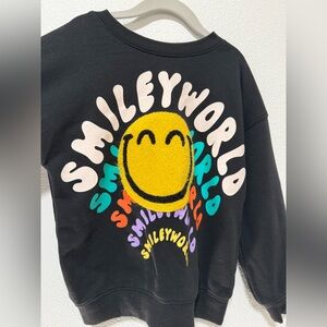 H&M Black Sweatshirt with Yellow Smiley and Multicolor Text
